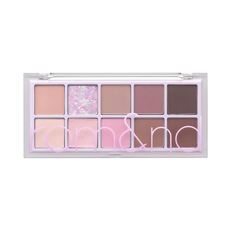 Øjenskyggepalette med 10 nuancer; lyserød, brun og en glitterfarve. Mærket "rom&nd".