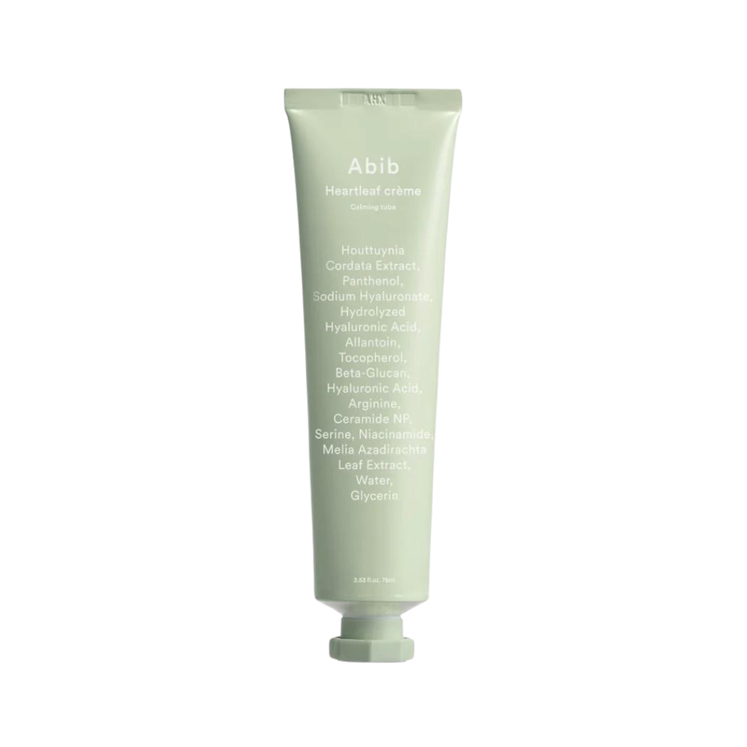 Lysegrøn tube med hvid tekst, der viser ingredienser til Abib Heartleaf Crème Calming Tube.