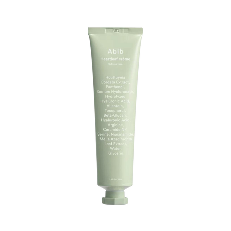 Lysegrøn tube med hvid tekst, der viser ingredienser til Abib Heartleaf Crème Calming Tube.