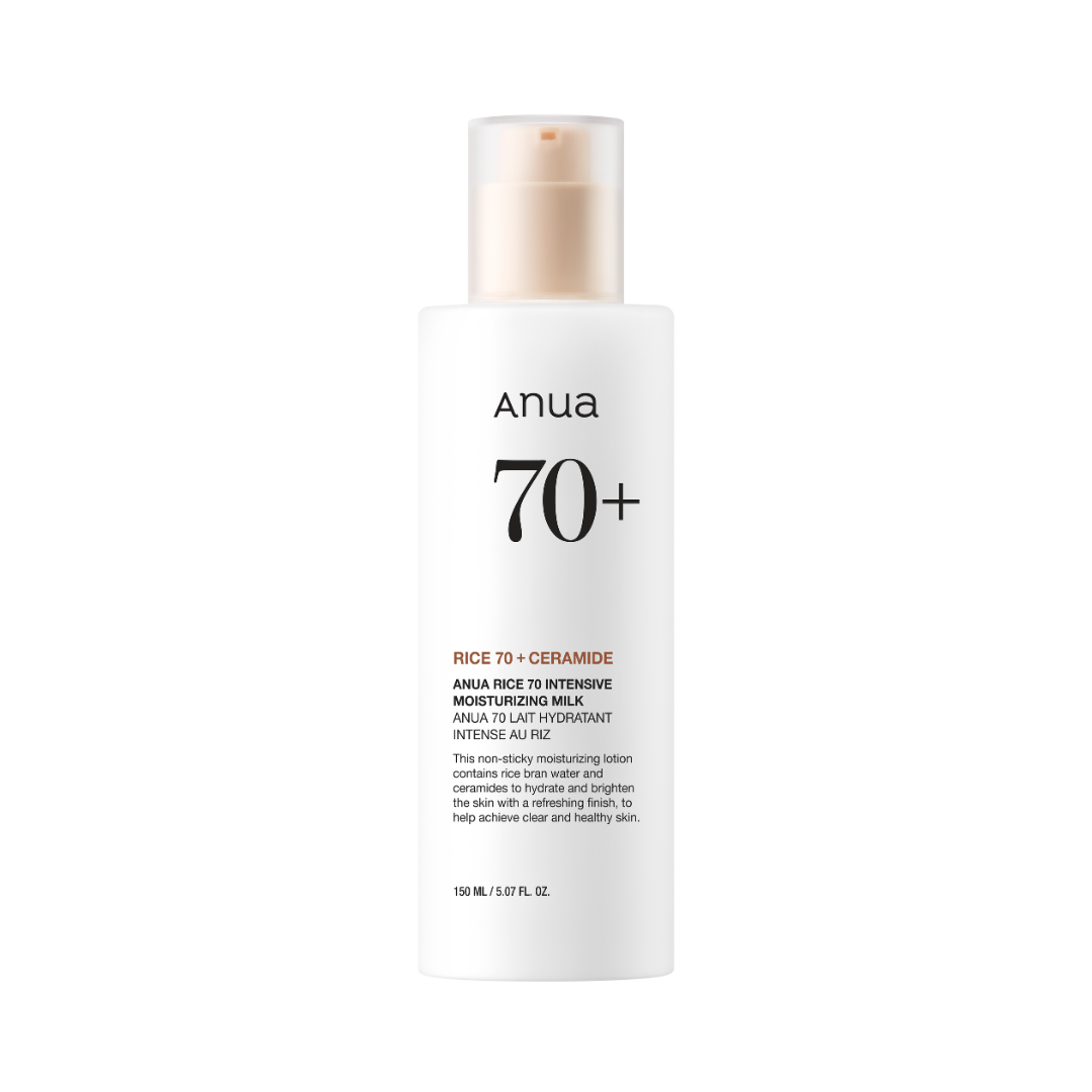 Hvid flaske med pumpe, mærket "anua 70+ Rice 70 Intensive Moisturizing Milk" i sort og orange tekst.