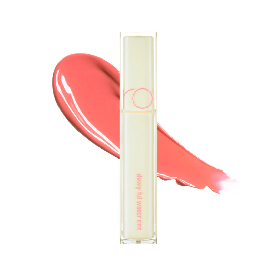 Klar tube med pink tekst og pink væskesplash bagved.