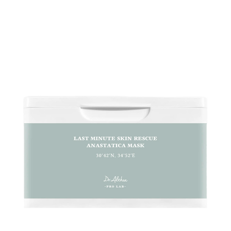 Hvid beholder med lyseblå etiket, tekst: "Last Minute Skin Rescue Anastatica Mask", Dr. Althea.