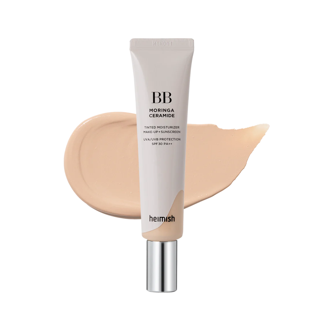 Tube af Heimish Moringa Ceramide BB Cream (#21 Light Beige) med beige swatch i baggrunden.