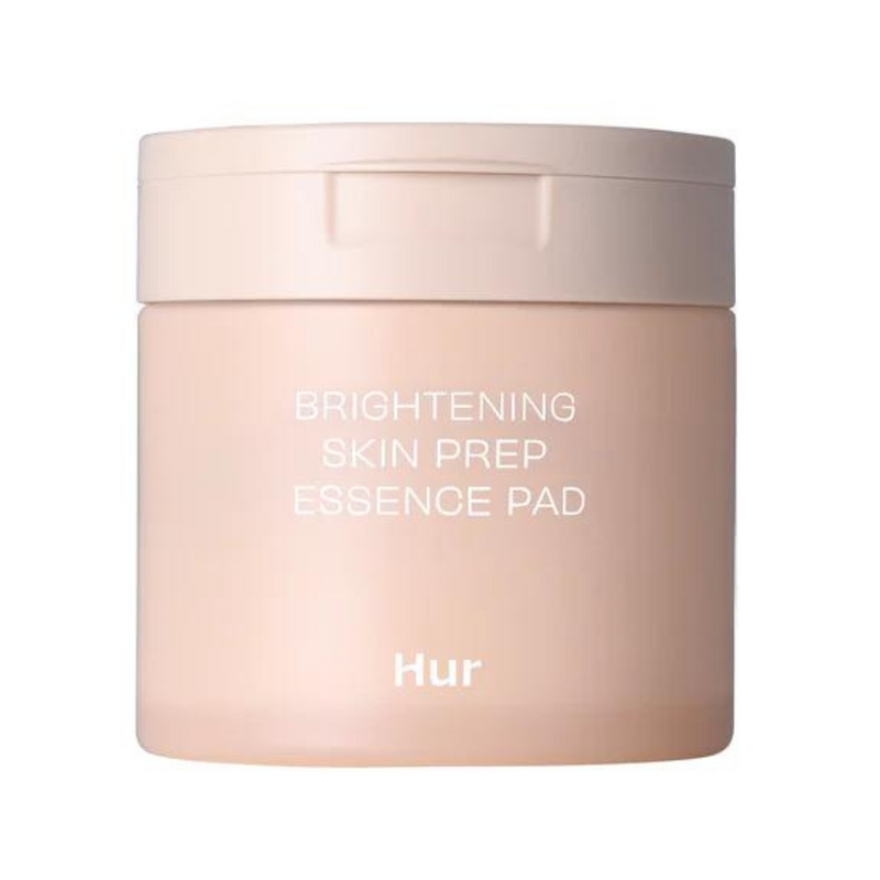Beige beholder med teksten "Brightening Skin Prep Essence Pad" og "Hur" i hvid skrift.