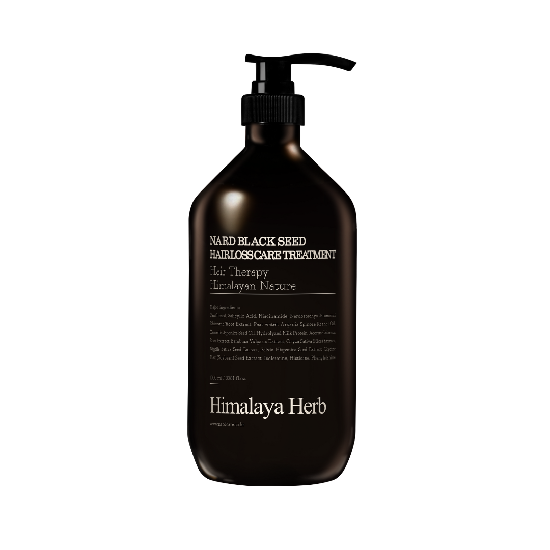 Sort flaske med pumpe, mærket "Nard Black Seed Hairloss Care Treatment" 1000 ml.
