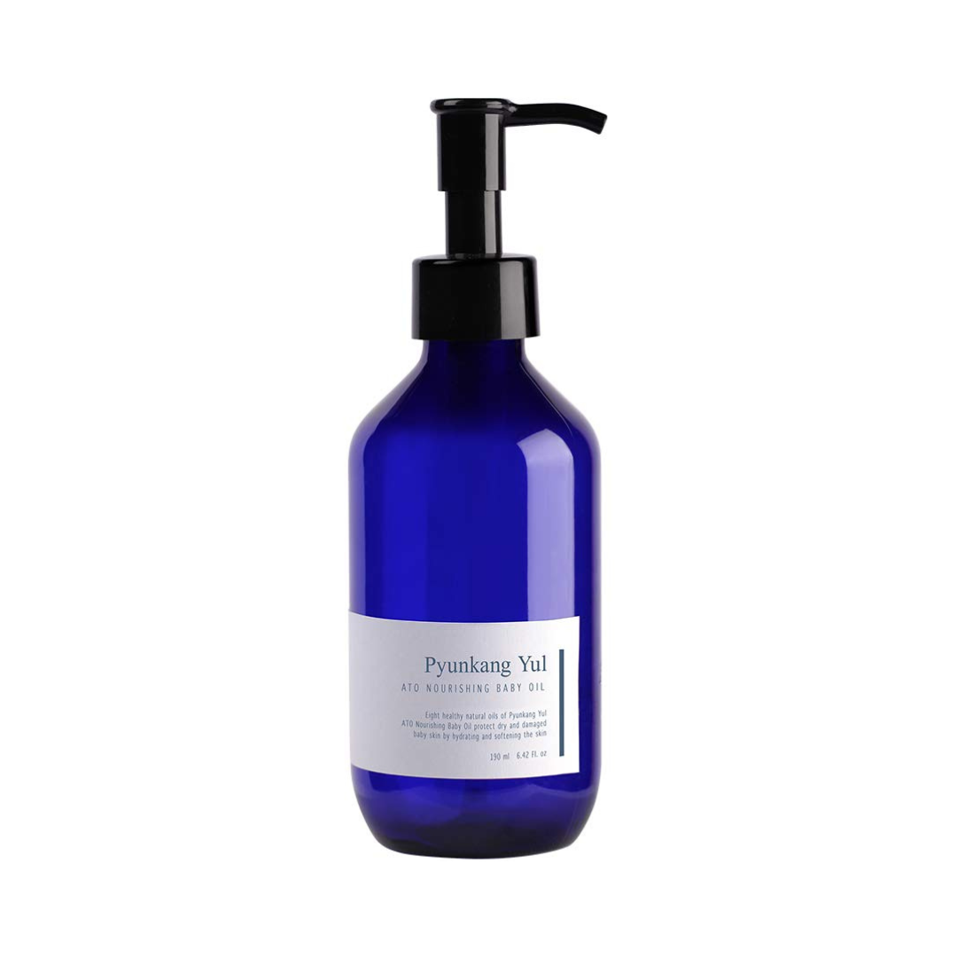 Blå flaske med pumpe og hvid etiket, Pyunkang Yul ATO Nourishing Baby Oil, 150 ml.