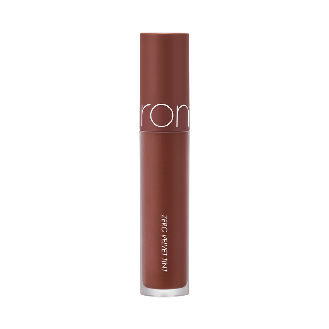 Brun tube med tekst "Zero Velvet Tint", dyb farve, minimalistisk design.