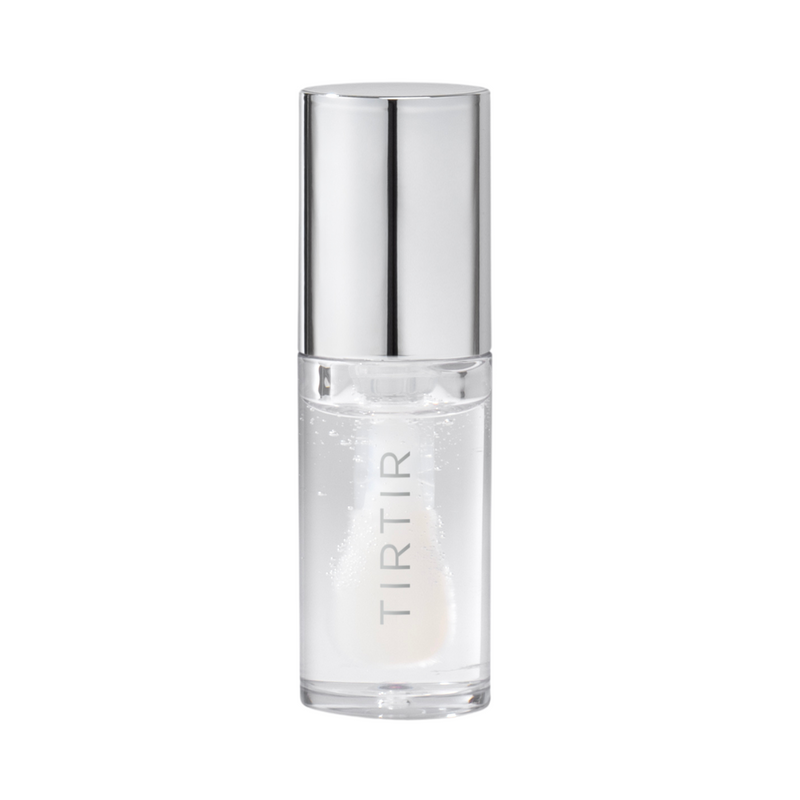 Klar flaske med sølvlåg, mærket "TIRTIR", indeholder gennemsigtig lip olie.