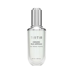 Flaske med sølvhætte, mærket "TIRTIR Ceramic Milk Ampoule", 40 ml.