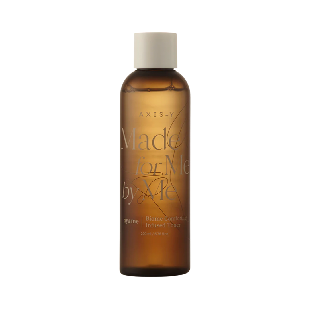 Brun flaske med hvid tekst og låg; Axis-Y Ay&me Biome Comforting Infused Toner, 200 ml.