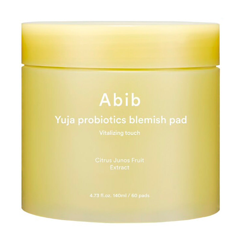 Gul krukke med teksten "Abib Yuja Probiotics Blemish Pad Vitalizing Touch" og produktinfo.