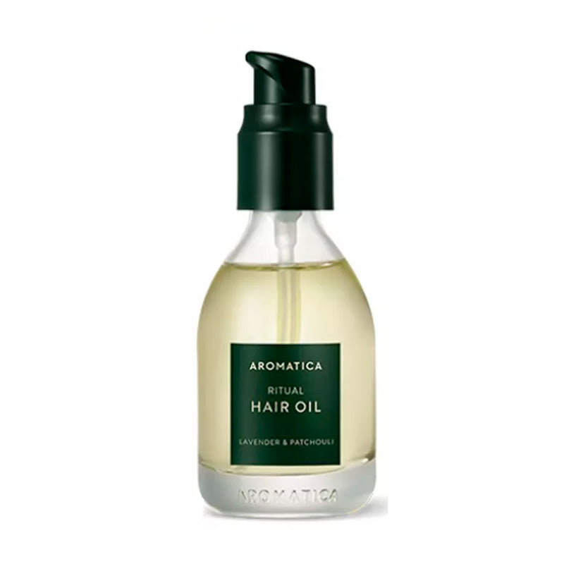 Flaske med mørkegrøn pumpe og etiket, indeholder Aromatica Ritual Hair Oil, lavendel og patchouli.