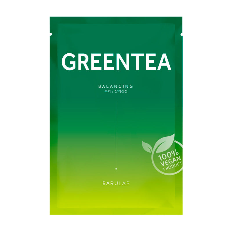 Grøn pakke med teksten "GREENTEA" og "100% VEGAN PRODUCT" badge med bladmotiv.