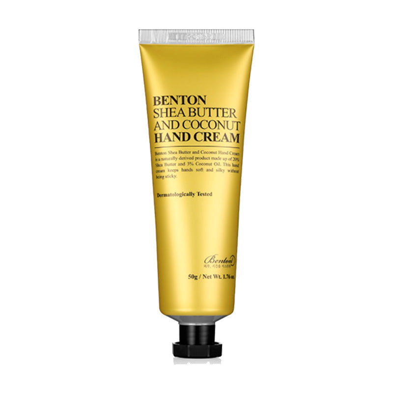 Gylden tube med sort tekst: "Benton Shea Butter & Coconut Hand Cream". 50g, dermatologisk testet.