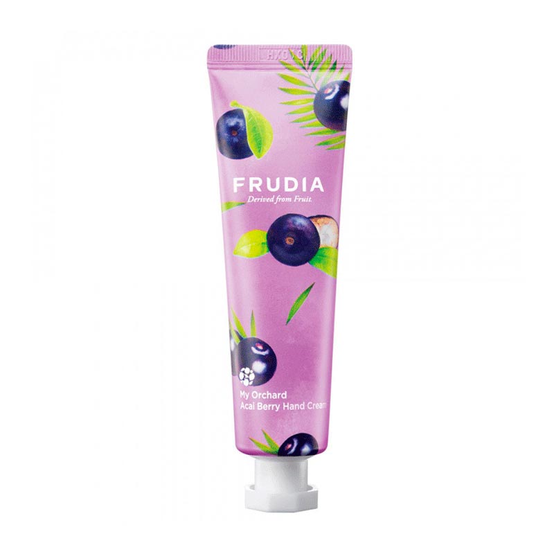 Lilla tube af Frudia håndcreme med acai bær og grønne blade. Tekst: My Orchard Acai Berry Hand Cream.