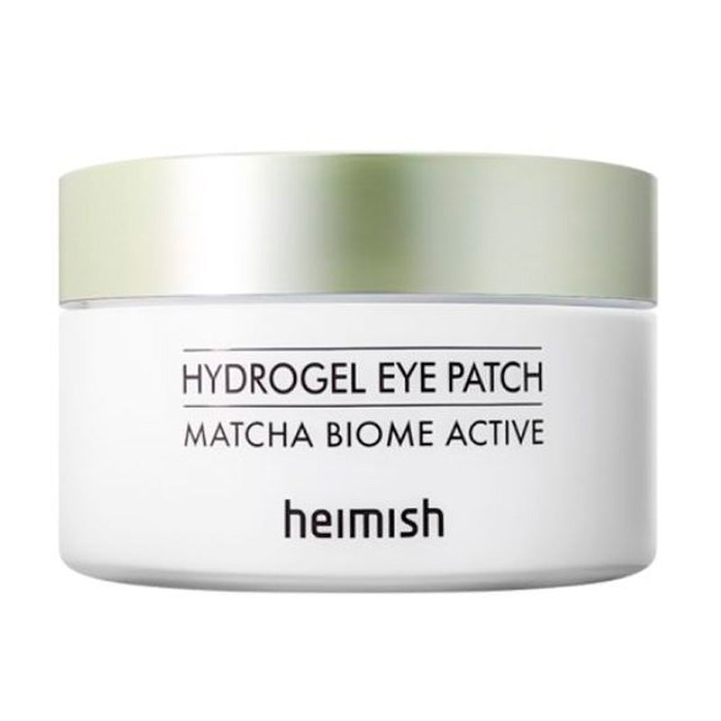 Hvid krukke med grøn låg, teksten: "Hydrogel Eye Patch Matcha Biome Active" og "Heimish."