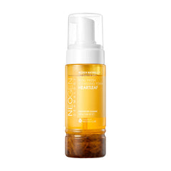 Gennemsigtig flaske med gul væske og hvid pumpe, Neogen Real Fresh Foam Heartleaf.