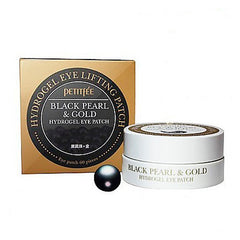 Guldæske og hvid beholder med tekst "Black Pearl & Gold Hydrogel Eye Patch" og sort perle.
