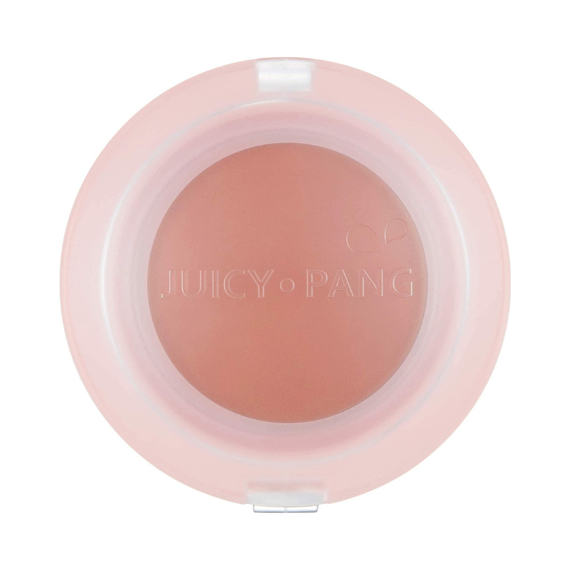 Rund blushbeholder i ferskenfarve, mærket "JUICY PANG" på låget.