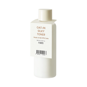 Hvid flaske med beige etiket: "Oat-in Silky Toner", 68,09% havre, 200 ml. Mærke: Purito.