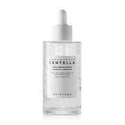 Klar flaske med pipette, indeholder SKIN1004's Centella Tone Brightening Capsule Ampoule, 100 ml.