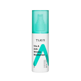 Flaske med hvid krop, teal hætte, tekst "TIA'M Vita A Anti-Wrinkle Moisturizer" og stort "A".