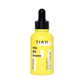 Gul flaske med sort pipette, mærket "TIA'M Vita B3 Source" og "Niacinamide", 40 ml.