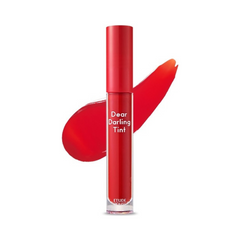 Klar tube med rød lip tint og teksten "Dear Darling Tint," med rød farveprøve bagved.