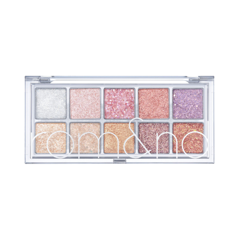 Makeup palette med 10 glitrede nuancer i en gennemsigtig æske, arrangeret i to rækker.