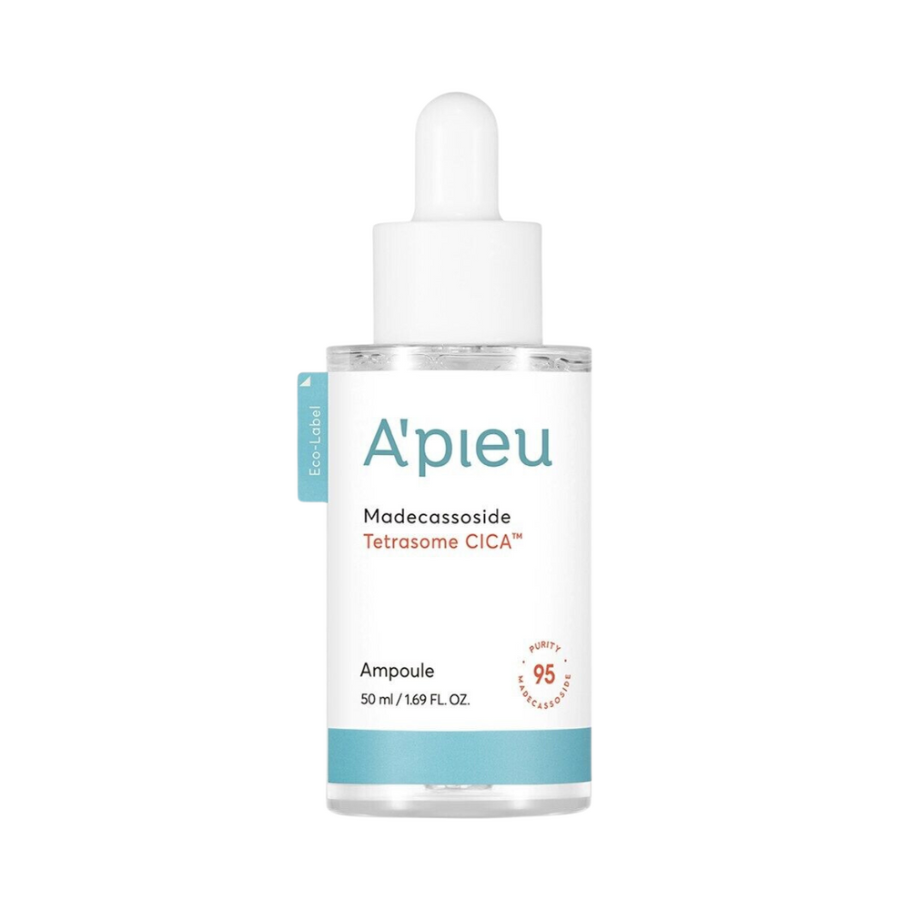 Klar flaske med hvid etiket, "A'Pieu" tekst, blå bund og hvid pipette. Indhold: 50 ml.
