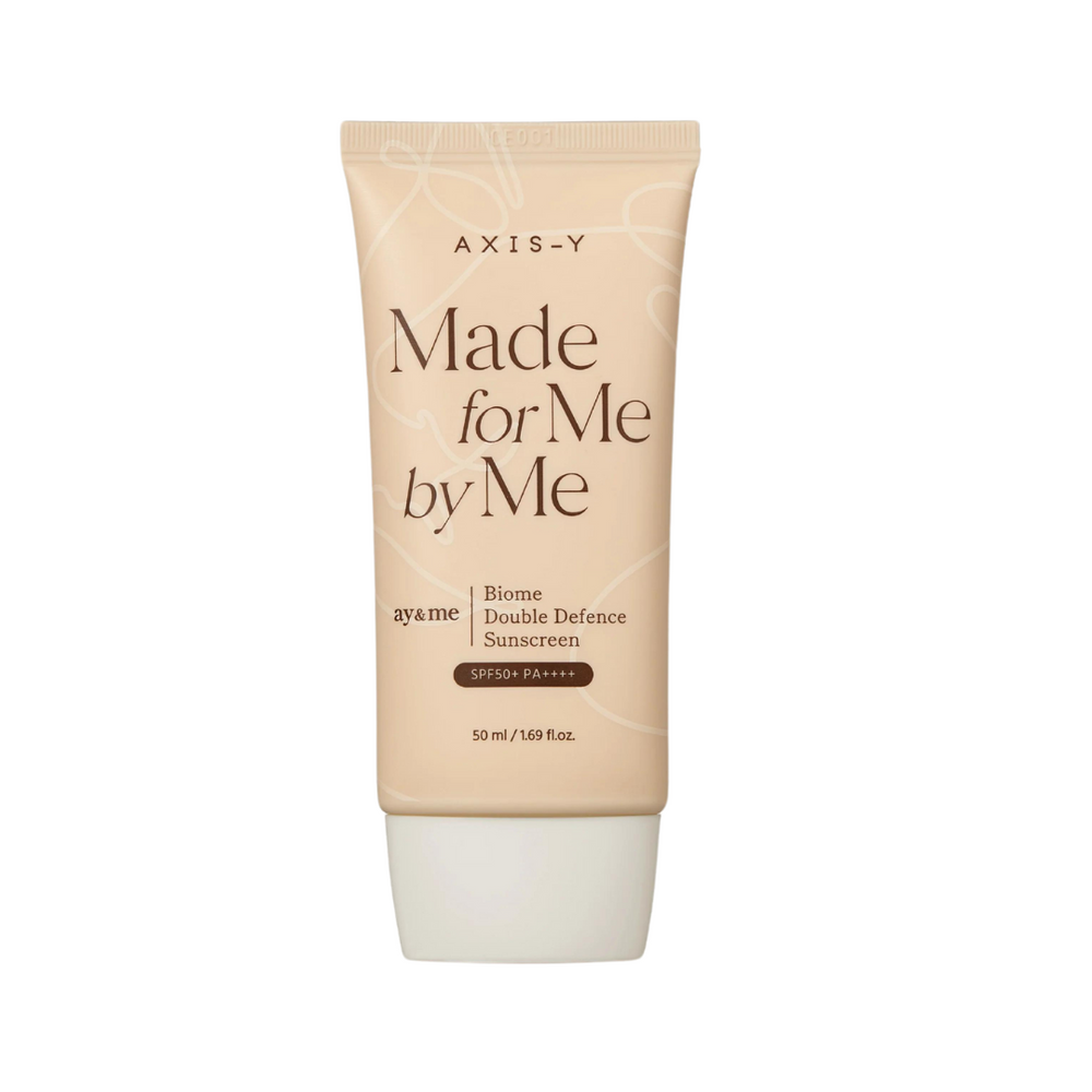 Beige tube med teksten "Made for Me by Me", SPF50+ PA++++, 50 ml.