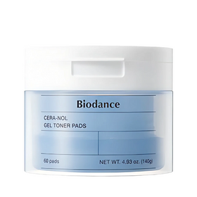 Hvid krukke med Biodance Cera-nol Gel Toner Pads, blå tekst på forsiden, indeholder 60 pads.