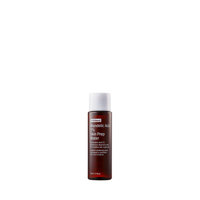 Brun flaske med hvidt låg, etiketten siger "Mandelic Acid 5% Skin Prep Water", 30 ml.