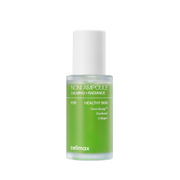 Grøn flaske med teksten "Noni Ampoule", "Calming + Radiance", "Celimax", og ingredienser nævnt.