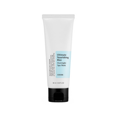 Hvid tube med sort låg, mærket "Ultimate Nourishing Rice Overnight Spa Mask" fra COSRX, 60 ml.
