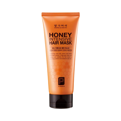 Orange tube med tekst "Honey Intensive Hair Mask" og honningmønster.