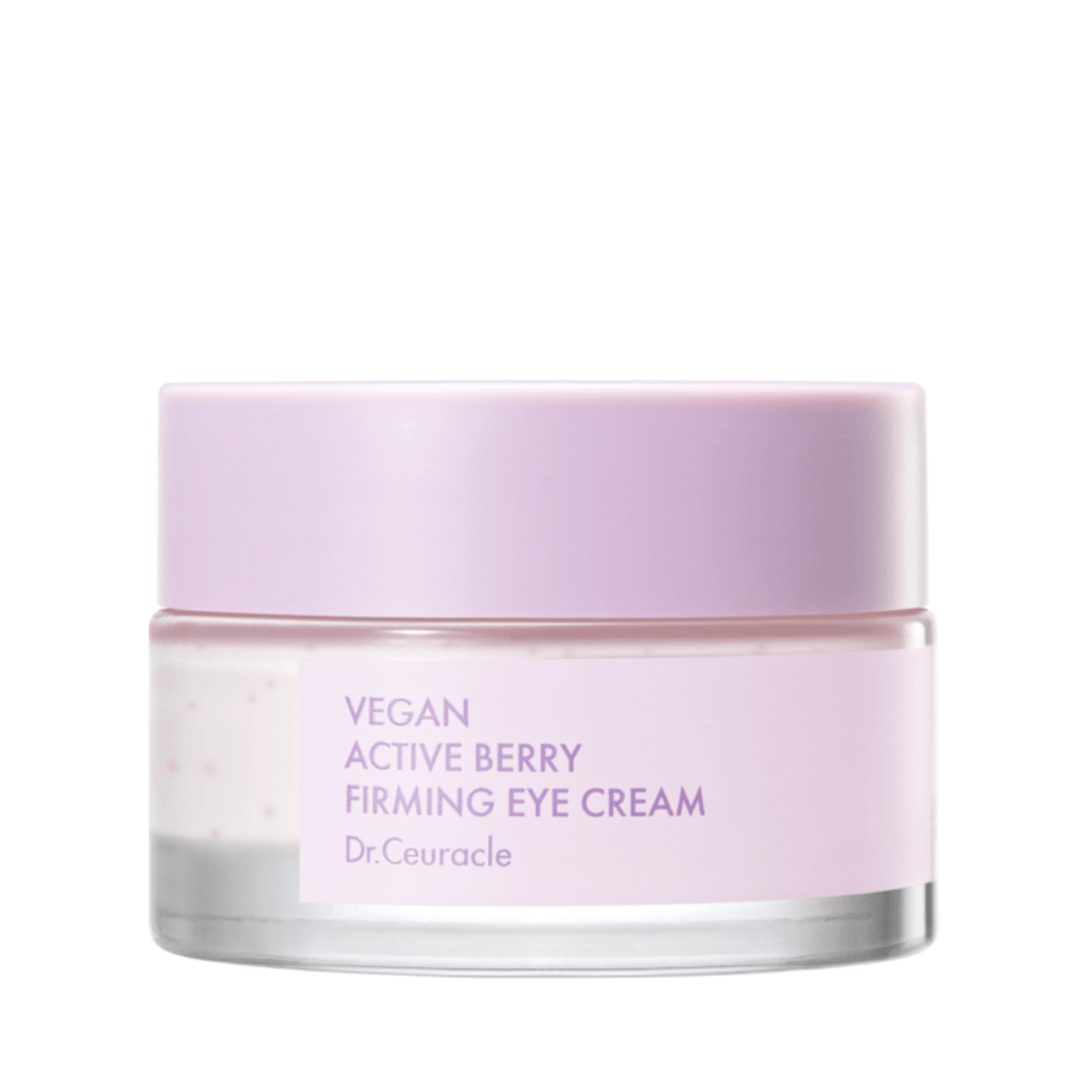 Lille krukke med lyserød låg, mærket "Vegan Active Berry Firming Eye Cream" af Dr. Ceuracle.