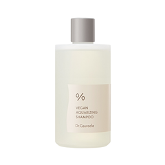Flaske med Dr. Ceuracle - Vegan Aquarizing Shampoo. Enkel, hvid etiket med grå skrift.