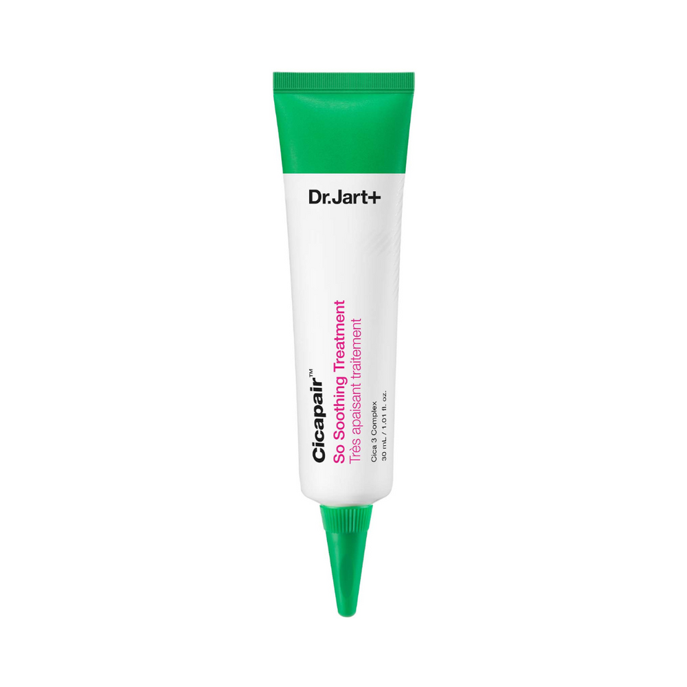 Hvid tube med grøn hætte, mærket "Dr. Jart+ Cicapair So Soothing Treatment" i sort og pink tekst.