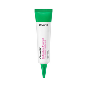 Hvid tube med grøn hætte, mærket "Dr. Jart+ Cicapair So Soothing Treatment" i sort og pink tekst.