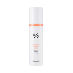 Hvid flaske med orange detaljer, tekst: "5α Control Clearing Toner", mærket Dr. Ceuracle.