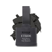 Sort beholder med tekst "ETUDE Pang Pang Hair Shadow" foran sort, tekstureret pulver.