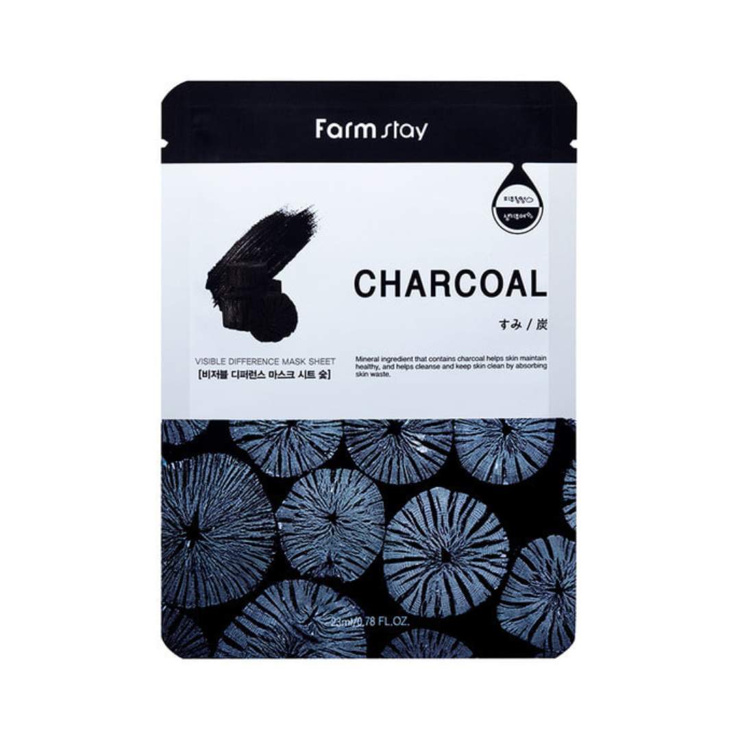 Sort maskeemballage med kultekstur, teksten "Farm Stay", "Charcoal" og koreanske tegn.