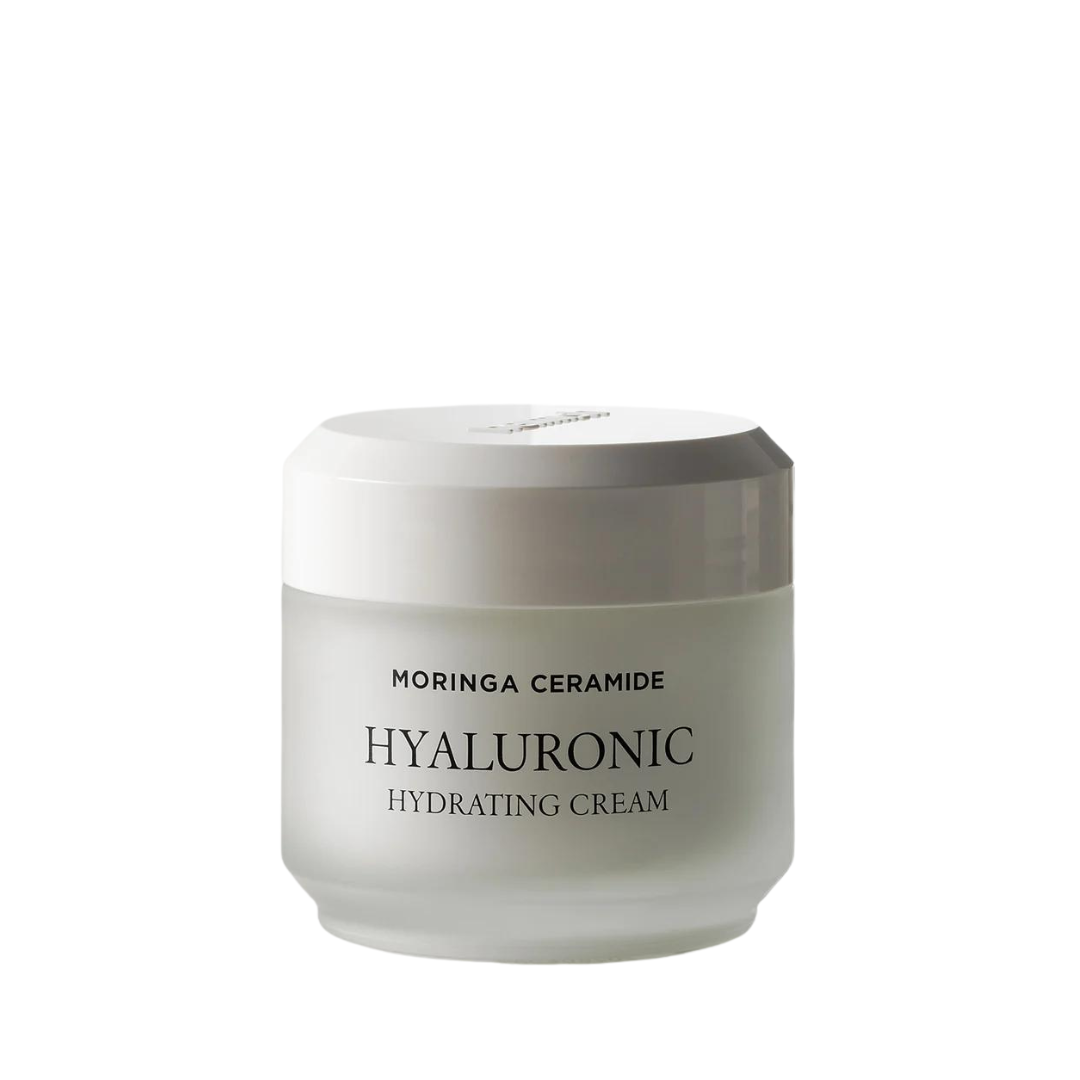 Hvid krukke med tekst "Moringa Ceramide Hyaluronic Hydrating Cream" på forsiden.