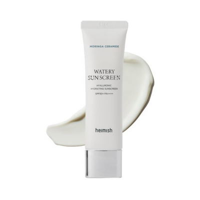 Hvid tube med Moringa Ceramide Watery Sunscreen SPF50+ PA++++, sølvhætte, flødeagtig baggrund.