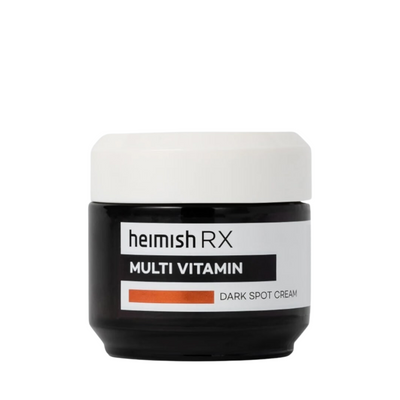 Sort krukke med hvidt låg, mærket "heimish RX Multi Vitamin Dark Spot Cream."