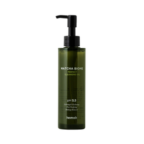 Grøn flaske med sort pumpe, mærket "Matcha Biome Perfect Cleansing Oil" af Heimish.