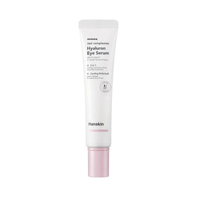 Hvid tube med lyserød hætte. Tekst: "Hanskin Real Complexion Hyaluron Eye Serum."