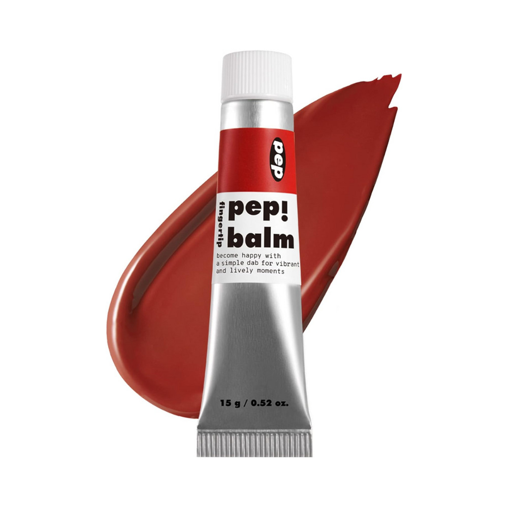 Sølvfarvet tube med rød etiket, "pep! balm", foran rød farvestribe. 15 g / 0.52 oz.