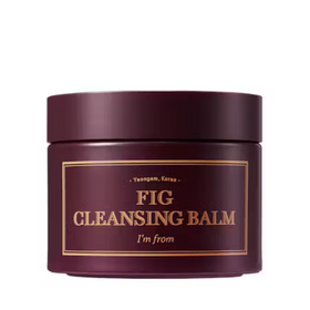 Mørk maroon krukke med guldtekst "Fig Cleansing Balm" og guldramme, mærket "I'm From".